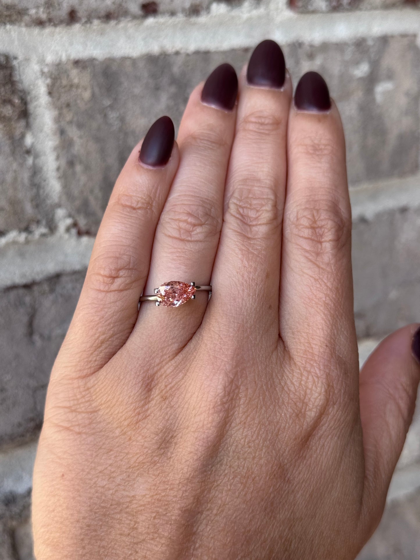 1.68 carat Fancy Vivid Pink Pear Diamond