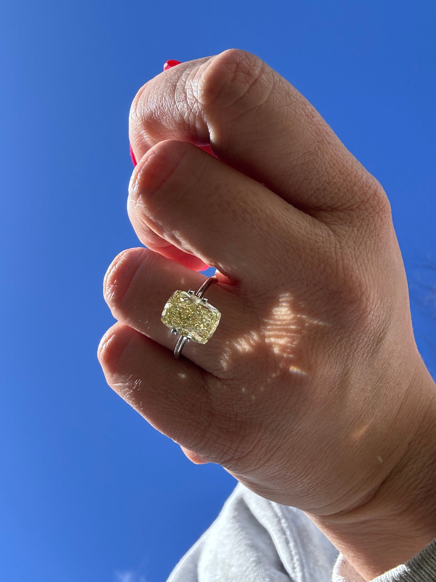 4.04 carat Fancy Intense Yellow Cushion