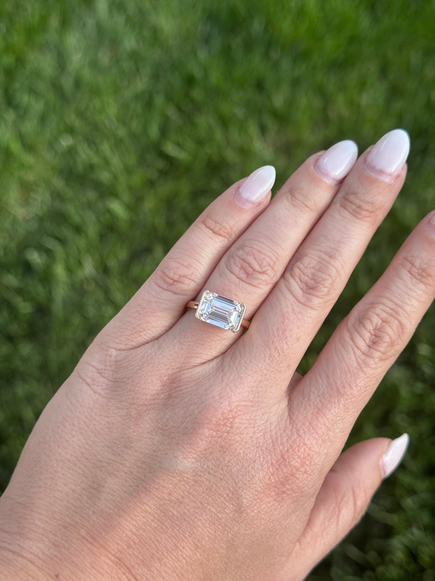 East West half bezel Diamond Engagement ring