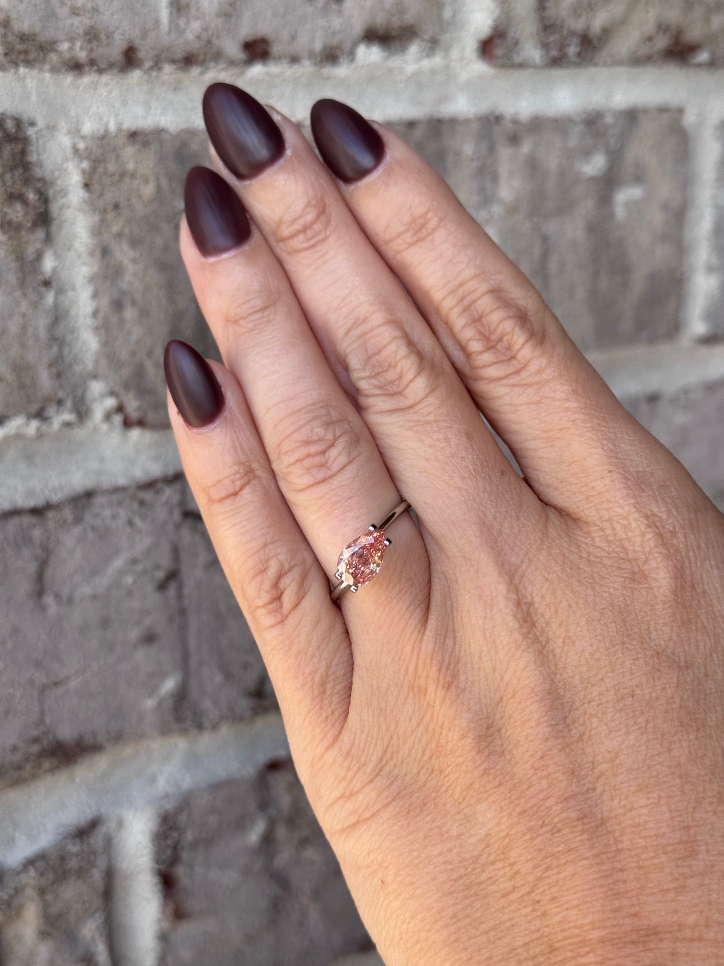 1.68 carat Fancy Vivid Pink Pear Diamond